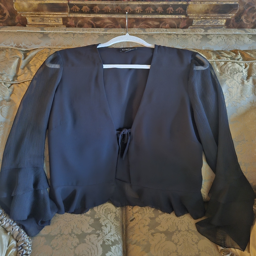 NWOT bebe black ruffle hem chiffon blouse